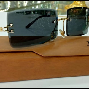 lunette Isra à la branche doré verre noir